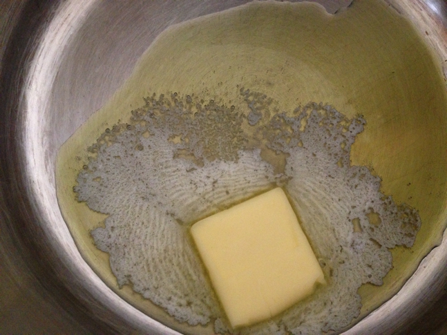 Melt butter with olive oil. This keeps the butter from burning.