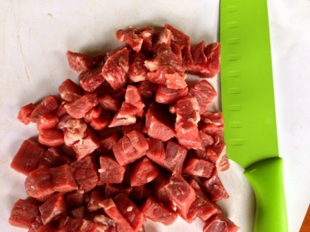 Chop beef into 1/2" cubes for cooking and adding to vegetable beef soup
